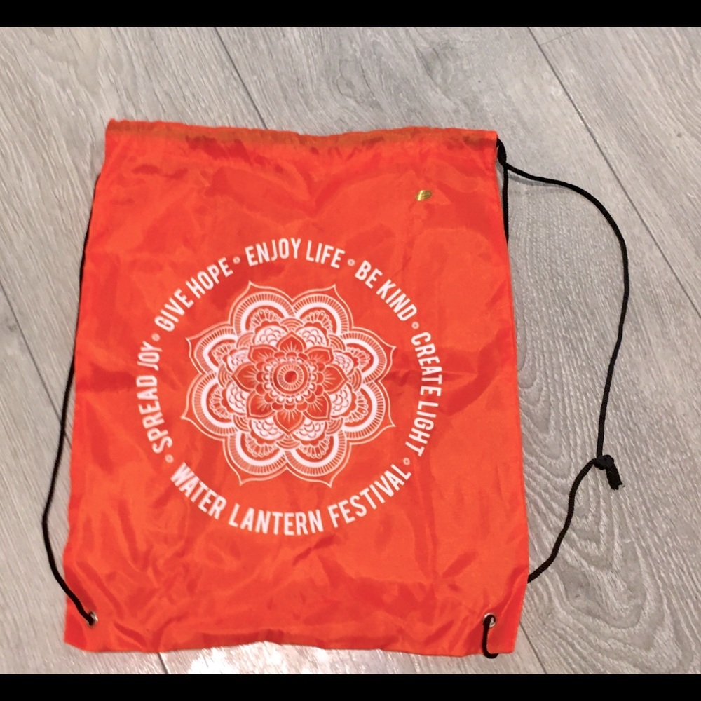 NWOT Neon Orange with White Lettering Water Lantern Festival Drawstring Backpack